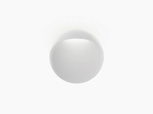 Flindt Væg arkitektonisk væglampe | lampe med skulpturel metalform der løftes let fra væggen og skaber et svævende visuelt udtryk